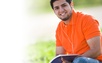 Happy Young Male Reading Book