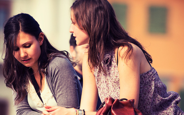 Two female friends talking