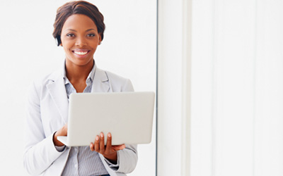 Female Student Holding Laptop