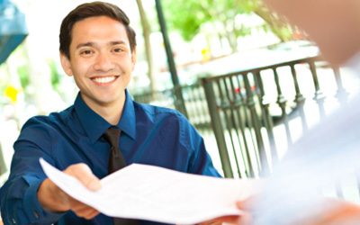 Student Handing In A Cover Letter