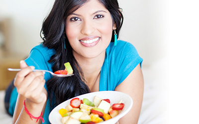 Student Eating Fruit