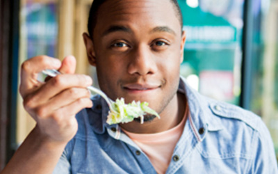 Student Eating A Salad