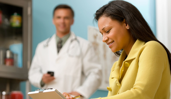 Woman talking to a doctor