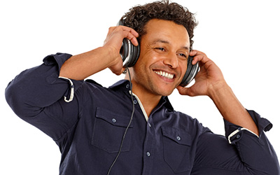 Student De-stressing By Listening To Music