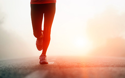 Person running on a road